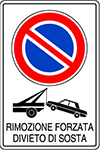 Parking zone with information about mandatory towing in Milan