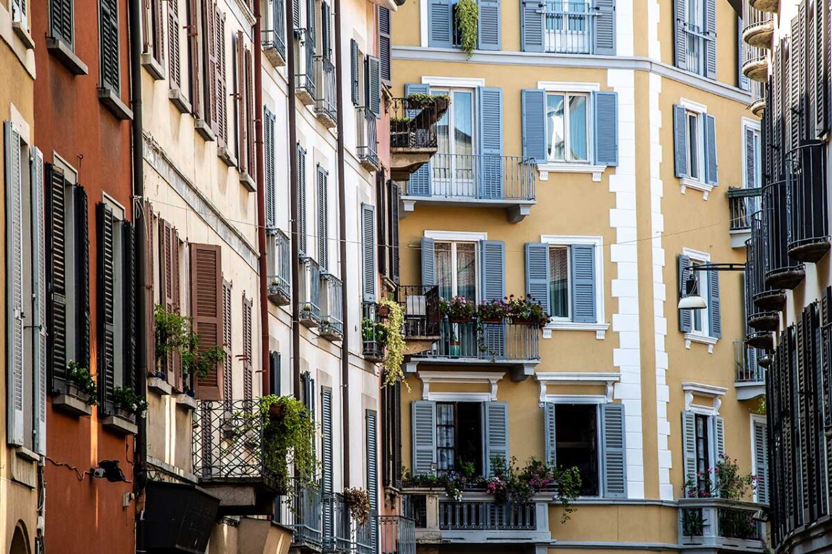 Colorful townhouses with windows and balconies in Brera 